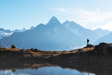 Amazing view on Monte Bianco mountains range with tourist on a background. Lac de Cheserys lake, Chamonix, Graian Alps. Landscape photography