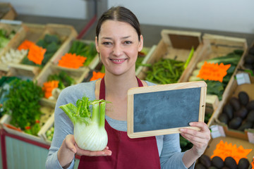 happy young woman in fruit store