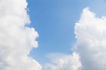 Canvas Print - Scenic sky background. Blue sky with fluffy white clouds. Copy space