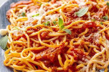 Pasta with tomato sauce served on plate