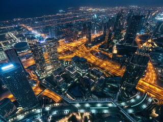Wall Mural - Beautiful night Dubai cityscape, United Arab Emirates, big modern city with high buildings and illuminated roads.