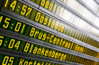 © MyMicrostock/Stocksy - Train station time table in Bruges