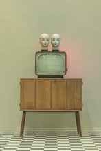 Light Experiment With Retro TVs And Doll Heads