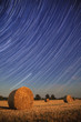 © Yaroslav Danylchenko/Stocksy - Star trails on the night sky.
