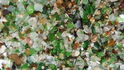 Wall Mural - Remote beach with small glass stones.  Laxe. Galicia,Spain