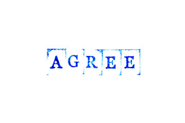 Wall Mural - Blue color ink of rubber stamp in word agree on white paper background