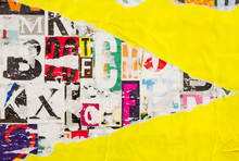 Torn Yellow Paper Poster On Colorful Collage From Clippings With Letters And Numbers Texture Background.