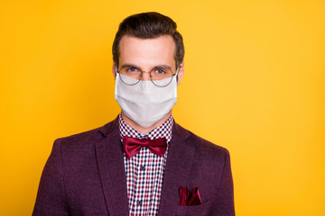 Sticker - Close-up portrait of his he nice attractive healthy guy mc artist wearing safety mask infection contamination prevention social distance isolated bright vivid shine vibrant yellow color background