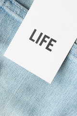 Wall Mural - Clothing label says life