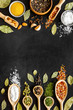 © 9dreamstudio - Spices and herbs frame - top view, copy space