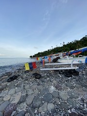 Wall Mural - Bateaux de pêches sur une plage de galets à Amed, Bali, Indonésie