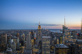 Fototapeta Nowy Jork - New York skyline at sunset with city lights