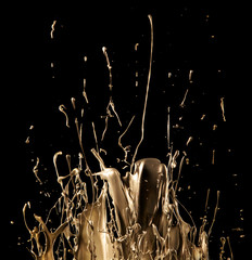 Wall Mural - Abstract sculptures of gold splashes of paint. Dancing liquid on a black background.