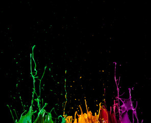 Wall Mural - Abstract sculptures of colorful splashes of paint. Dancing liquid on a black background.