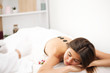 © ostap_davydiak - Young beautiful woman receiving spa treatment in spa beauty salon. Wellness massage. Beauty salon.