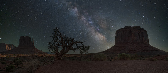 starry night sky over the monument valley