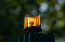 Orange Lantern On The Gate With Bokeh Background
