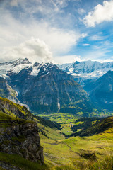 Wall Mural - View of the Grindelwald valley in the alps mountains above the village of Grindelwald, Switzerland.