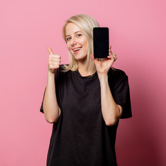 Poster - Blonde woman in  black moch-up tshirt and mobile phone