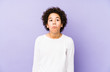 © Asier - African american little boy isolated shrugs shoulders and open eyes confused.