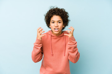 Wall Mural - African american little boy isolated upset screaming with tense hands.