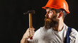 © Yevhen - Builder in helmet, hammer, handyman, builders in hardhat. Bearded builder isolated on black background. Bearded man worker with beard, building helmet, hard hat. Hammer hammering