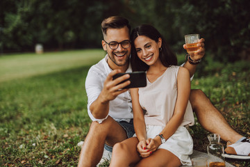 Wall Mural - young couple drinking wine