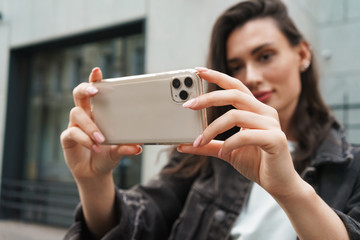 Young woman using mobile phone