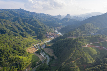 Aerial photography canyon river village in China