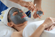 © surachetkhamsuk - Beautiful Asian woman in mask on face in spa beauty salon, enjoying and relaxing time, skin care and healthcare concept