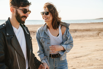 Wall Mural - Happy young couple spending fun time together