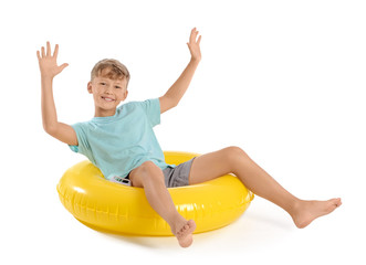 Poster - Cute little boy with inflatable ring on white background