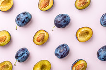 Blue Plums On Pink Background