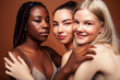 © iordani - young pretty asian, caucasian, afro woman posing cheerful together on brown background, lifestyle diverse nationality people concept