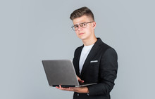 Teen With Computer. Male Shopping Online. Internet Blogging Marketing. Small Business Owner. Using Modern Technology. Teen Boy Wear Black Formal Jacket. Young Businessman Work On Laptop