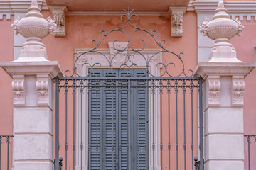 Beautiful forged iron gate (ancient architecture).