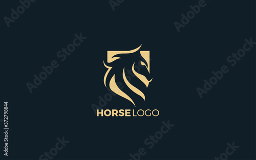 Cuadros en Lienzo Luxury horse logo formed with simple and modern shape in gold color