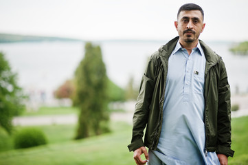 Traditional clothes indian pakistan male portrait.