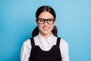 Sticker - Close-up portrait of her she nice attractive pretty charming brainy genius knowledgeable cheerful cheery teen schoolgirl isolated on bright vivid shine vibrant blue color background