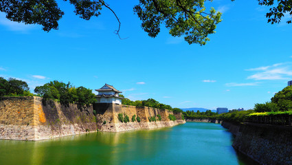 Poster - Panoramic shot of the Osaka Castle Park Osaka in Japan  on a blue sky background