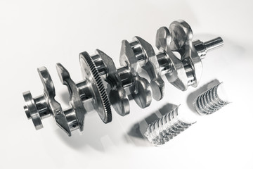 Wall Mural - crankshaft and new kit of main bearing set on the white background