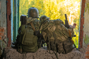 Two airsoft teammates on a smoke break