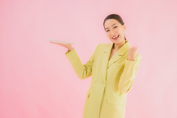 Poster - Portrait beautiful young asian business woman with dish or plate