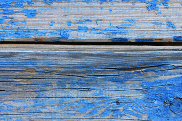 Wall Mural - Wooden rustic old timber board texture background. Weathered wooden panel painted in blue color. Aged timber grunge surface pattern with empty copy space