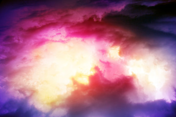 Wall Mural - Sunset light and colorful sky with big clouds.