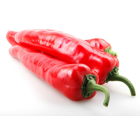 Sticker - Closeup of red chili peppers isolated on a white background