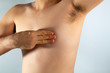 © Antonio Tanaka - close up of a man's chest looking for signs of male breast cancer
