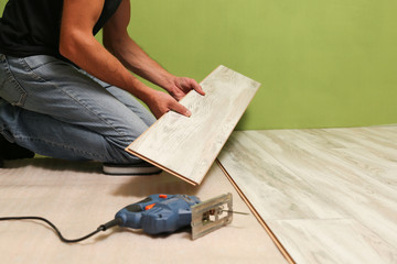 Wall Mural - laying laminate on the floor