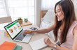 © weedezign - Asian woman order grocery online with laptop at home.new normal digital lifestyle with technology shopping onlne