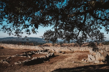 Horizontal shot of dry stone wall and ruins of an ancient civilization from the village in Portugal